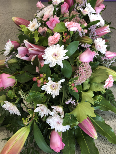 Gentle Embrace - A beautiful sympathy arrangement in delicate pastel shades, thoughtfully created to bring comfort during a difficult time.
